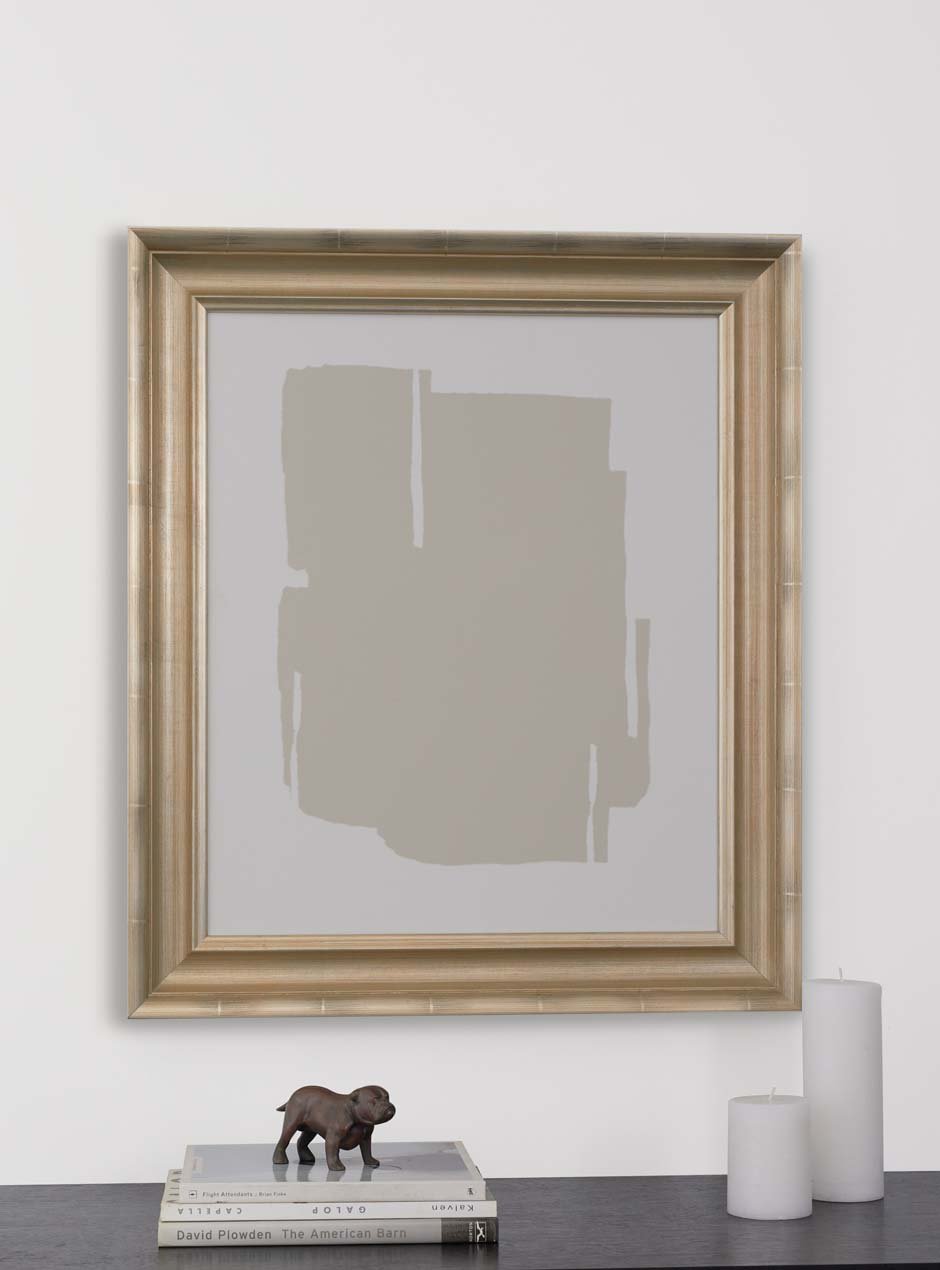 gold frame hung in home