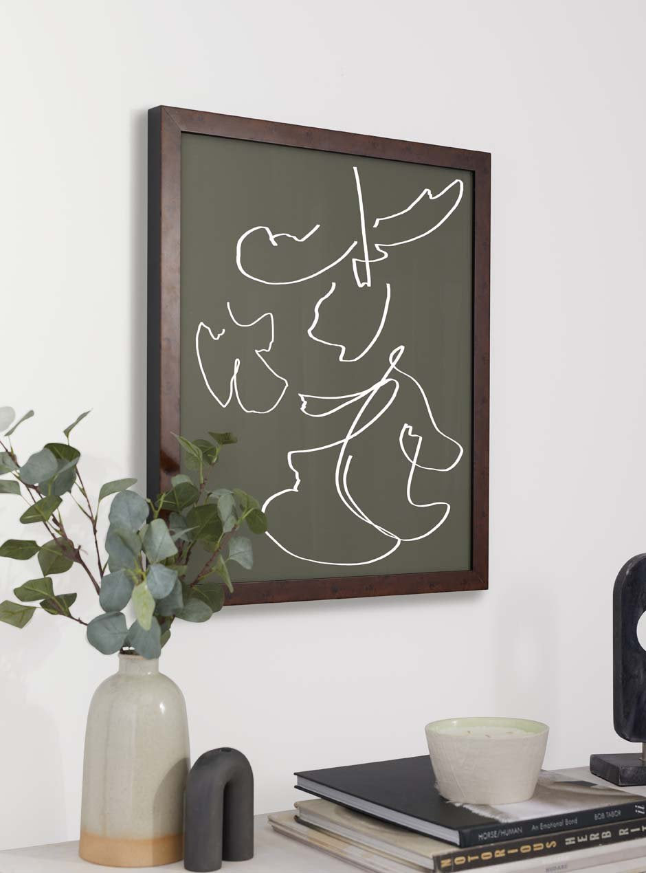 dark wooden frame hung in home