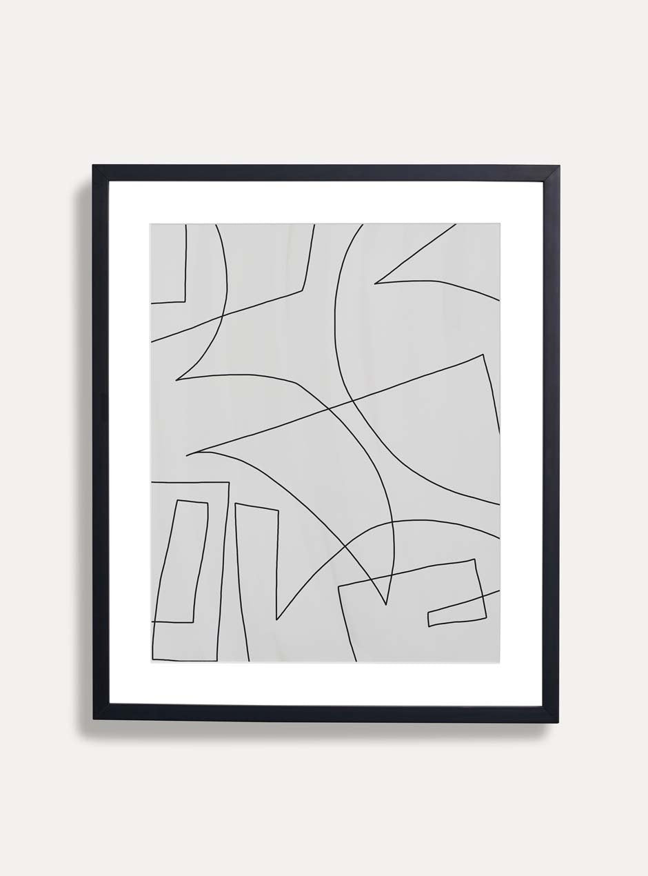 thin modern black wood frame with white matboard and linear modern abstract artwork on a white wall