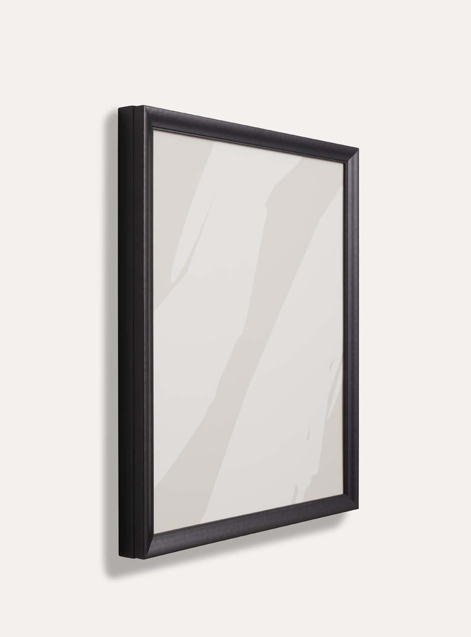 side profile showing depth and two layers of black textured picture frame with pitched down moulding style with abstract neutral artwork