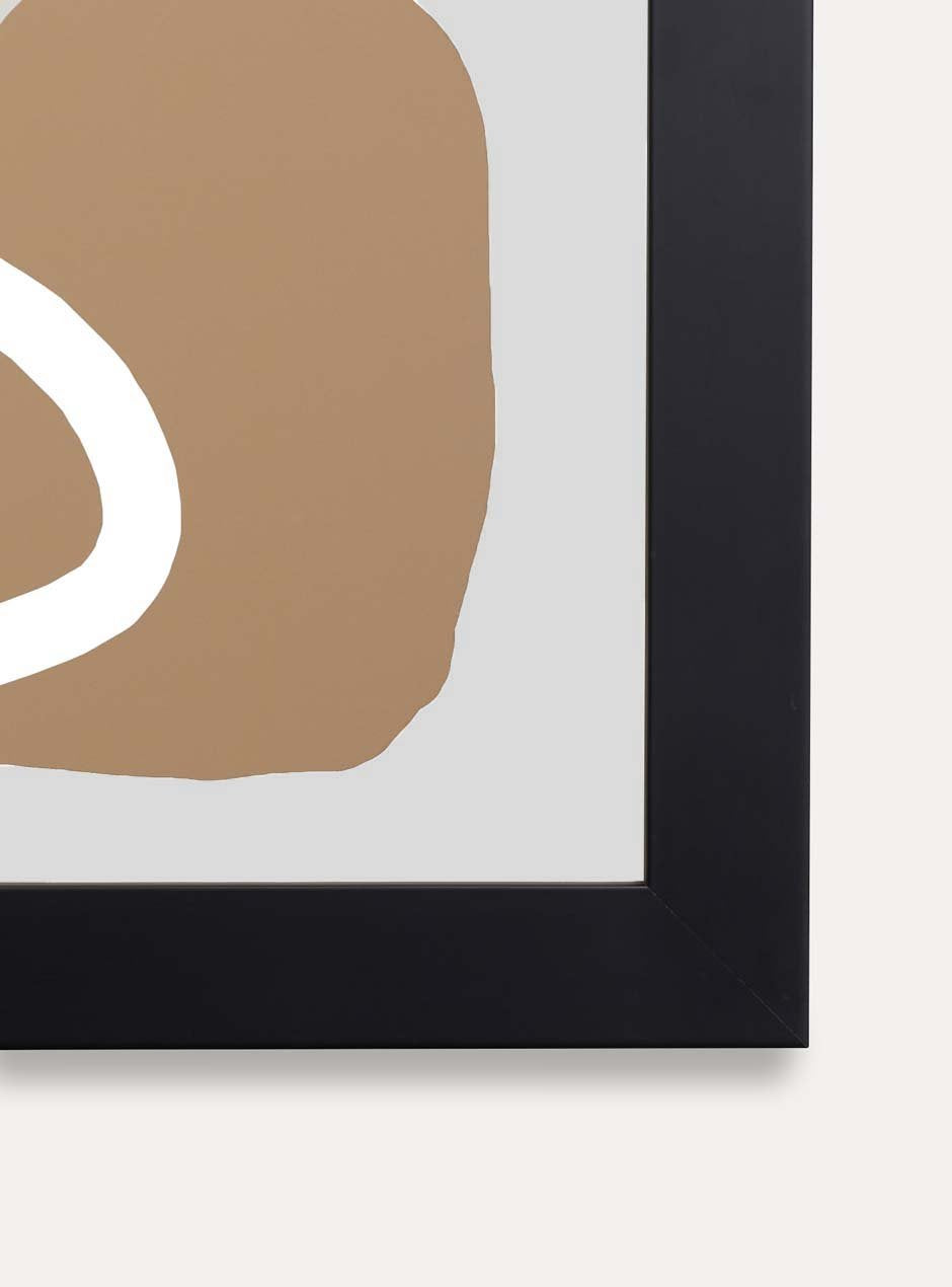 detail photo of black skyframe wide frame called agbes with neutral tone abstract artwork inside hanging on plain wall modern style