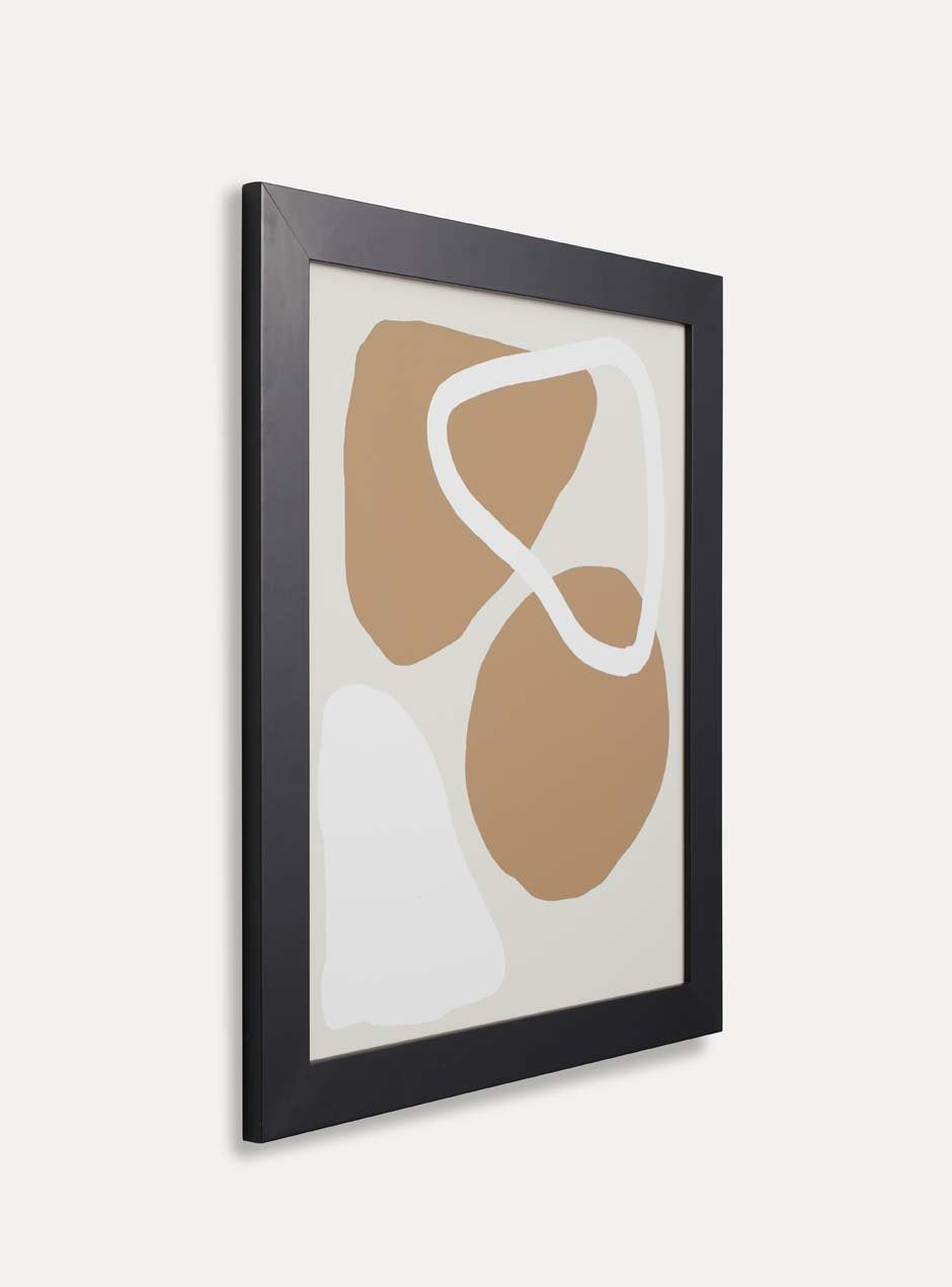 side profile black skyframe wide frame called agbes with neutral tone abstract artwork inside hanging on plain wall modern style