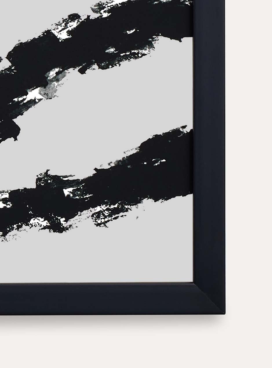 close up of corner of black frame holding abstract art
