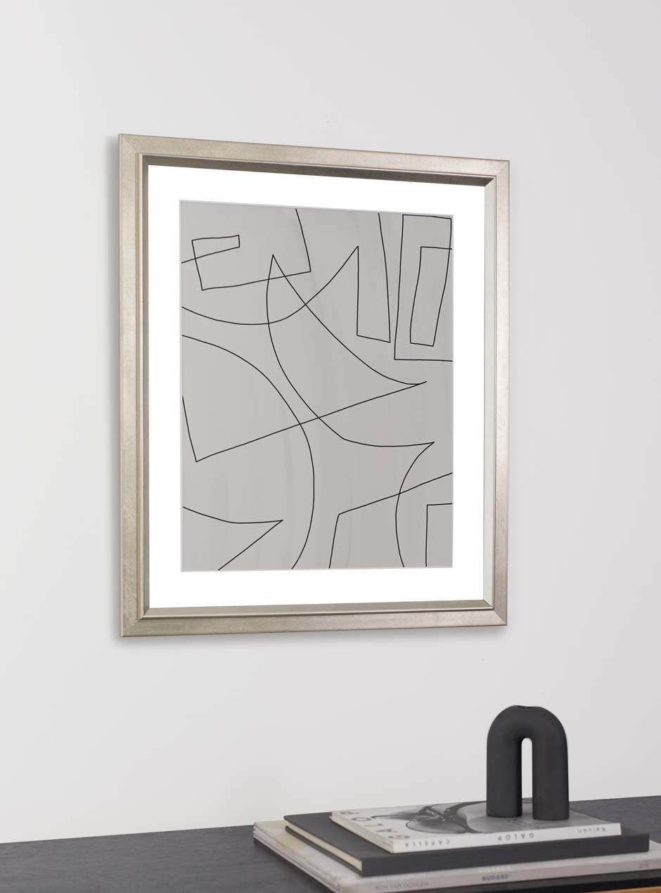 silver frame hung in home