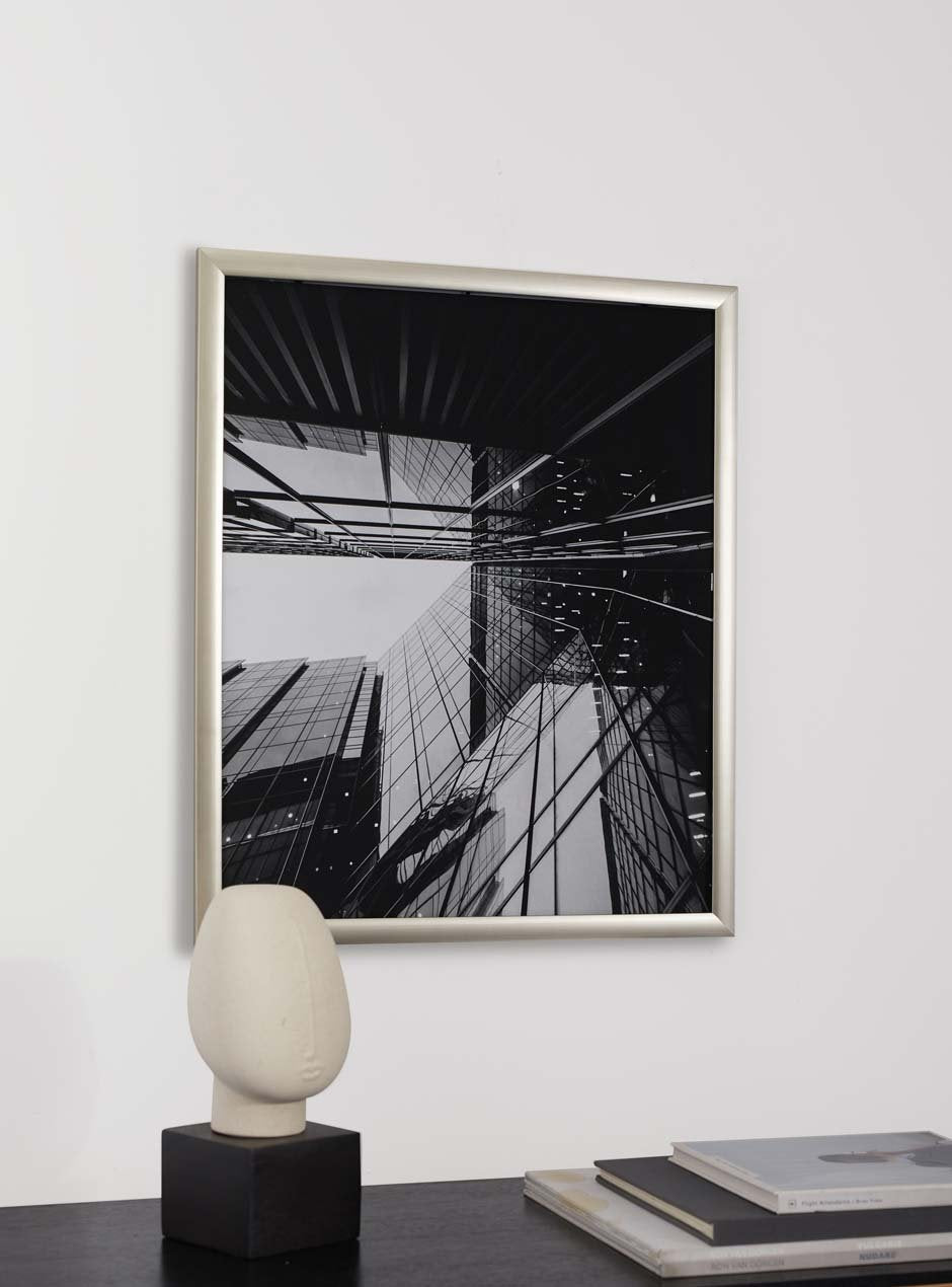 silver frame hung in home 