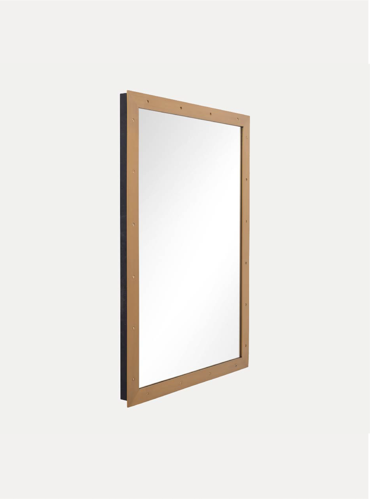 side view of custom brass framed mirror with screw detail